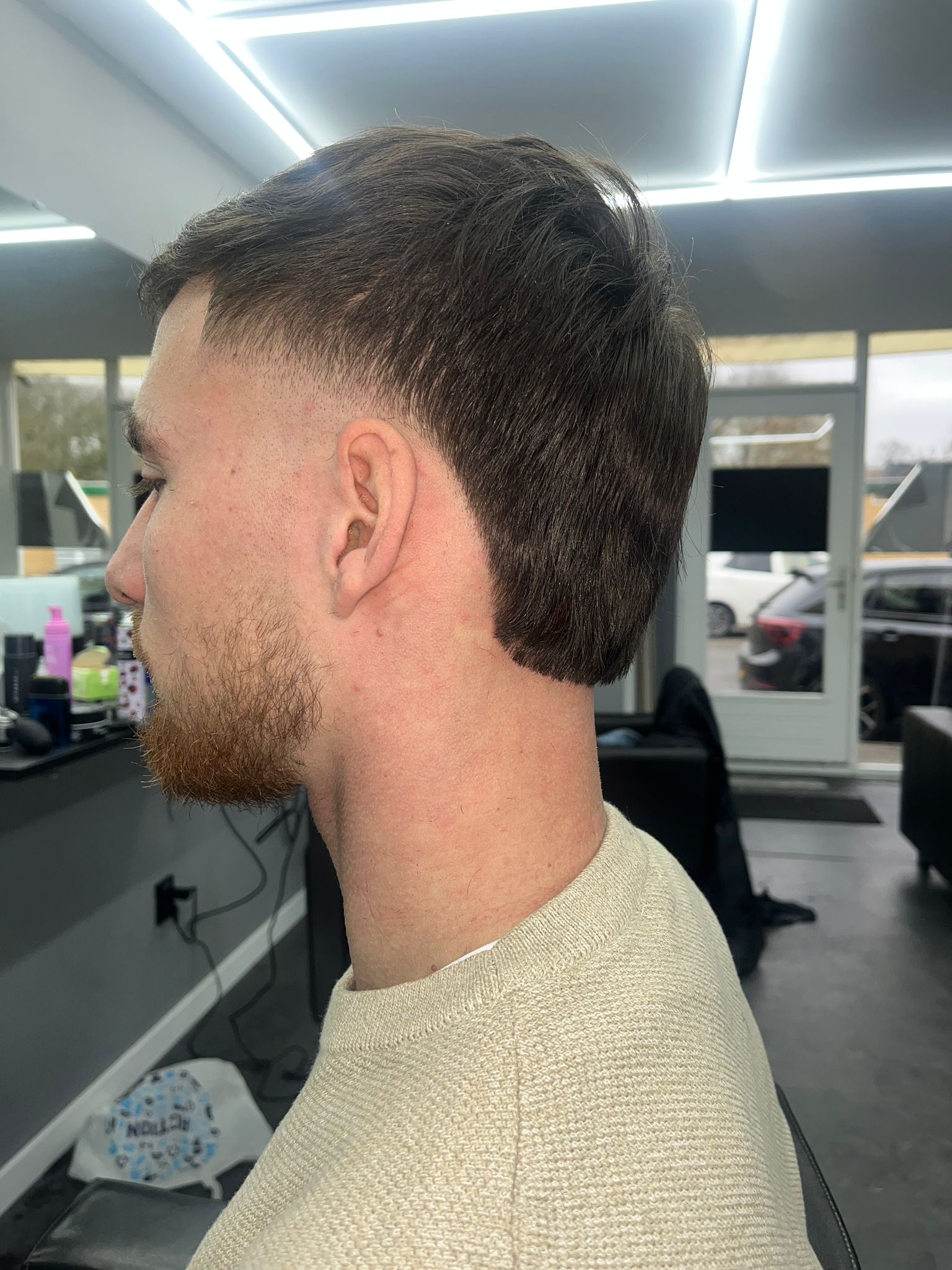 Taper fade met natuurlijke afwerking